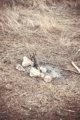 Ash of an extinguished campfire
