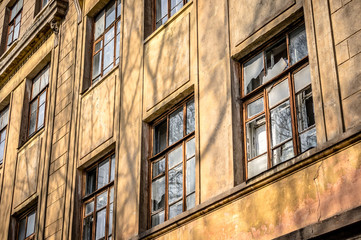 Old abandoned building. Ruined school. Destroyed construction.