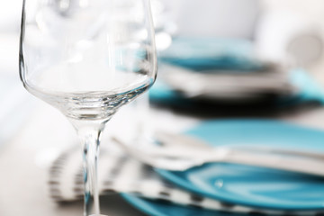 Empty glass on table in restaurant, closeup