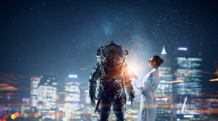 Scientists designing space suit. Mixed media © Sergey Nivens