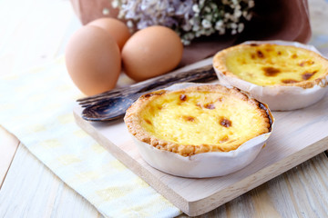 Egg tart on wooden background