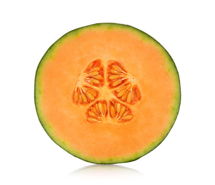 A half of cantaloupe melon isolated on white background.