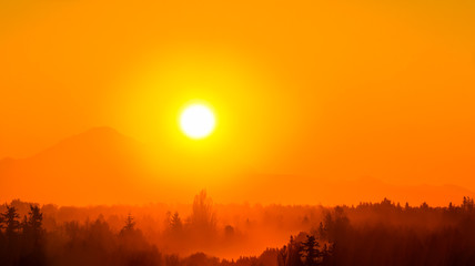 Orange Sunrise Over Mount Baker