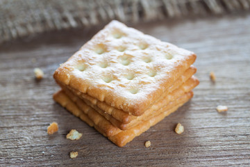 Crackers or biscuit on wooden background