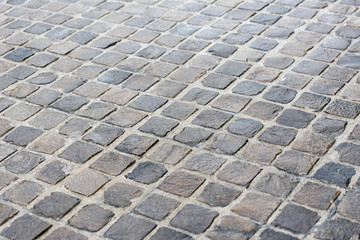 Pavement of granite, wet tile 