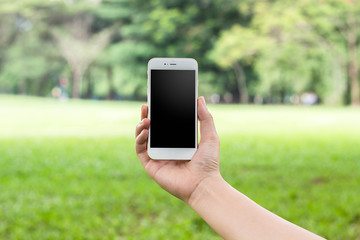 Hand holding smartphone.