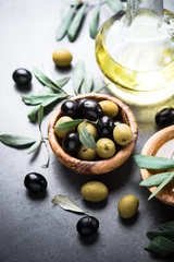 Foto op Plexiglas Black and green olives and olive oil. © nadianb