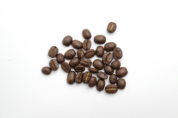 The top view of coffee beans isolate on white background