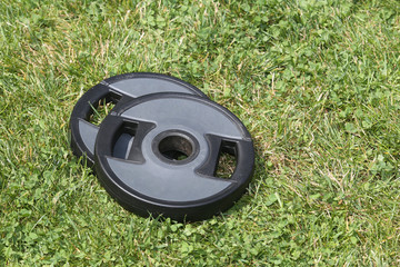 dumbbells on grass.outdoor training