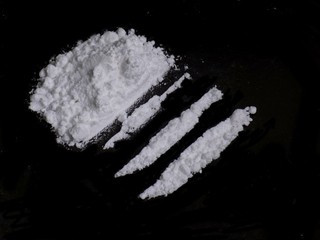 Cocaine drug powder pile and lines