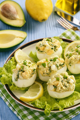 Stuffed eggs with avocado, garlic and leek.