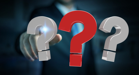 Businessman using 3D rendering question marks