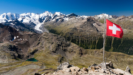 Piz Bernina and Morteratsch Glacier with Swiss flag, Engadin, Switzerland