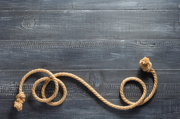 ship rope at wooden background