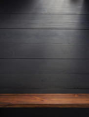shelf on black wooden background