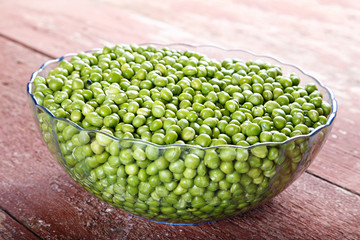Young green peas peeled