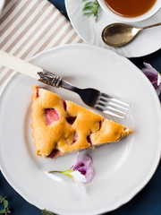 Strawberry pie from mixed flour. Spring summer still life. Sweet food festive treat. Flat lay