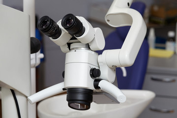 Professional endodontic medical binocular microscope in the dental office