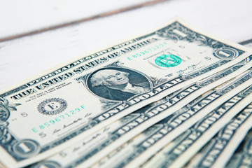 American dollars on the wooden table background, United states money, finance concept