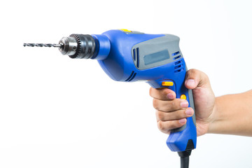 Hand with cordless screwdriver or drill isolated on a white background. With clipping path