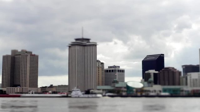 new orleans city skyline across river