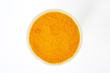 turmeric powder ring on glass