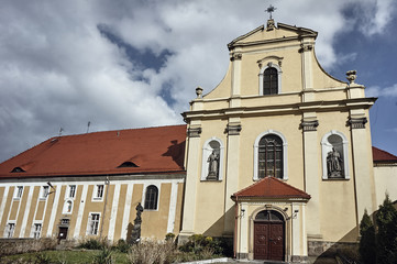 Fototapeta na wymiar Facade of baroque monastic church in Poland.