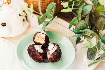 Homemade raw bounty candy, healthy vegan dessert. Selective focus.