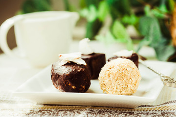 Homemade raw chocolate candy, bounty, Raffaello..Healthy vegan dessert