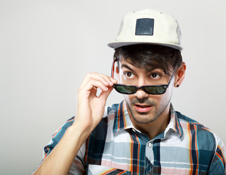 Man Looking Over Glasses