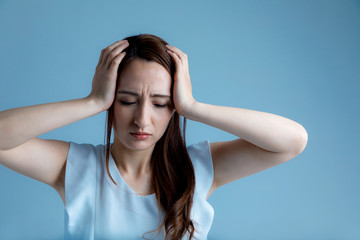 young woman have a headache