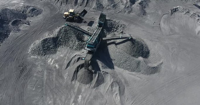 Machine for mechanical sorting of bulk materials into fractions. Rumble used to disperse materials such as coal, ore.
