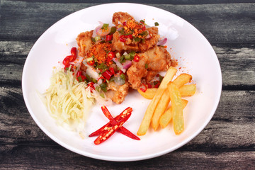 Spicy crispy deep-fried Karaoge chicken salad.