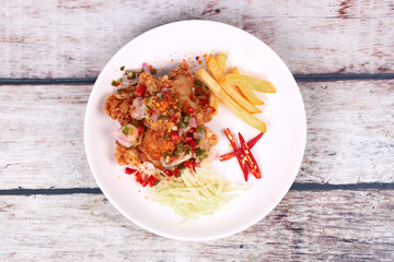 Spicy crispy deep-fried Karaoge chicken salad.