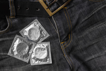 Condoms on jeans pocket.