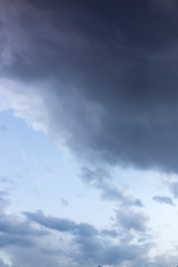 Beautiful clouds at sunset after rain as background .