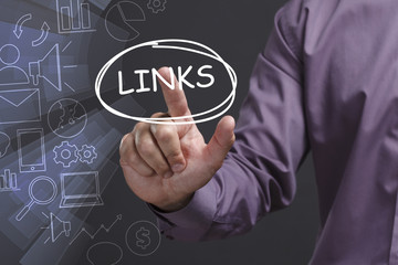 Business, Technology, Internet and network concept. Young businessman shows the word: Links