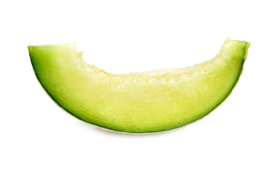 Green cantaloupe melon slices isolated on white background