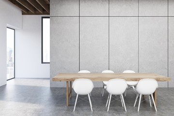 Gray kitchen with a table