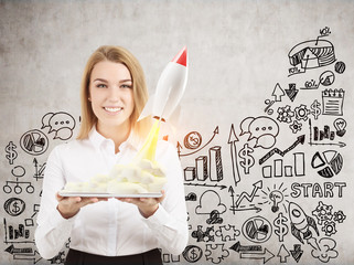 Woman with tablet and small rocket, sketch