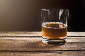 Whiskey on wooden surface