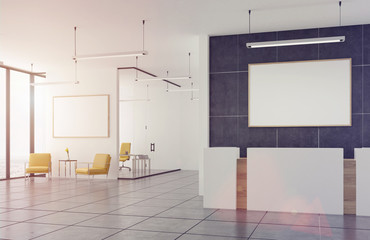 Empty office yellow armchairs and reception, toned