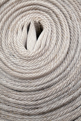 Background Fire hydrant rolled up. Close-up. Texture