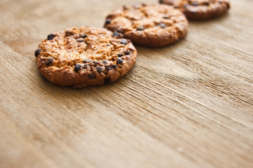 Cookies on rustic wooden  table. Chocolate dessert.