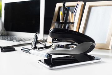 Office leather desk table with computer, supplies