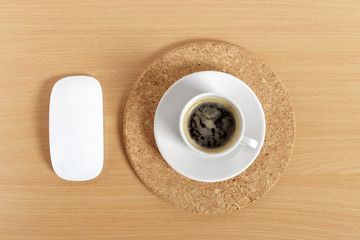 Desktop. Break. A cup of coffee. Computer mouse