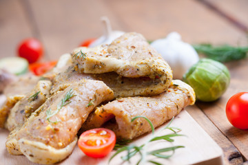 Raw marinated pork meat and vegetables 