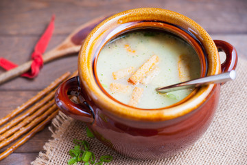 Cheese soup and bread sticks 