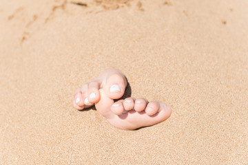 Toes in sand