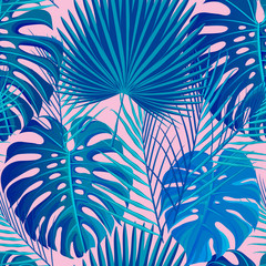 Modèle sans couture tropical avec des feuilles de palmiers exotiques.
